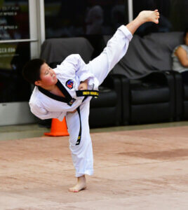 Conner Ho Side Kick during his test at United States Taekwondo Academy, 190 E. Stacy Rd. Allen, TX. 75002 4696320828 Benefits of Taekwondo Classes